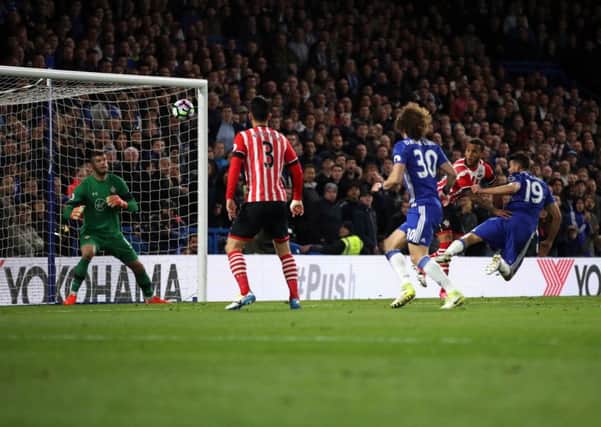Diego Costa (No 19) scores his first and Chelseas third goal against Southampton with a diving header. Picture: Nick Potts/PA Wire