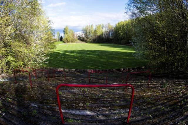 A section of overgrown terracing is all that remains of Cathkin Park. Picture: SNS.