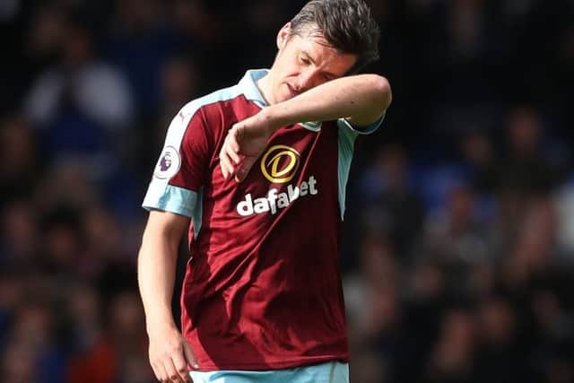 Joey Barton's Burnley are sponsored by an online bookmaker. Picture: Martin Rickett/PA Wire