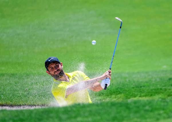 France's Alexander Levy plays out of a bunker on his way to the first-round lead at the China Open in Beijing. Picture: AFP/Getty Images