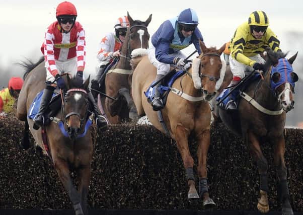 Brian Harding (wearing blue)  will be hanging up his saddle after the Heineken UK Closing Time Standard Open National Hunt Flat Race.  Picture: Alan Crowhurst/ Getty