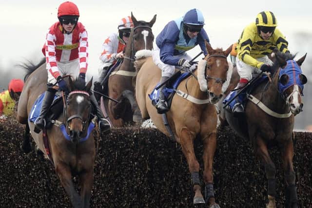 Brian Harding (wearing blue)  will be hanging up his saddle after the Heineken UK Closing Time Standard Open National Hunt Flat Race.  Picture: Alan Crowhurst/ Getty