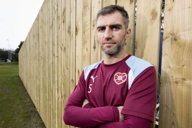 Aaron Hughes is seen by Ian Cathro is a vital player in his plans. Picture: SNS.