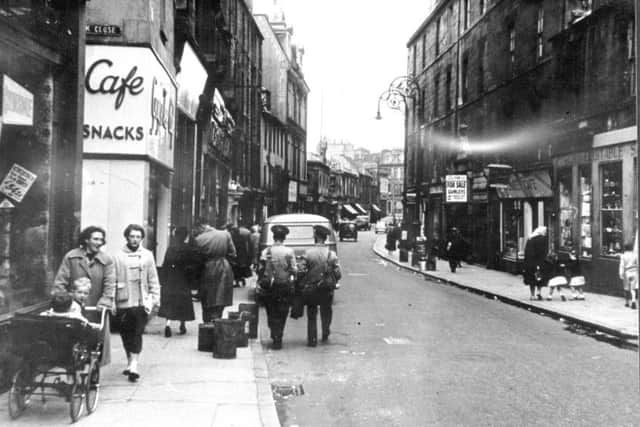 An undated shot of people walking in the old Kirkgate in Leith, Edinburgh (probably late Fifties, early Sixties).