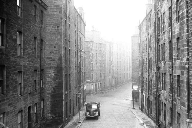Heriot Mount beside James Clark's School  looking towards Dumbiedykes Road on right and St Leonard's Hill on the left  and Carnegie Street straight ahead.  All were demolished within a few years.