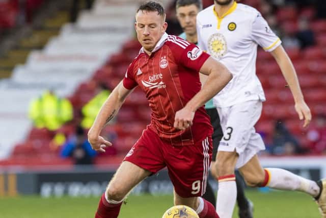 Aberdeen striker Adam Rooney is confident the Dons will stay fresh after an 11-month season. Picture: SNS.