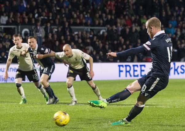 Ross County's Liam Boyce completes his hat-trick from the penalty spot. He went on to net a fourth. Picture: Craig Foy/SNS