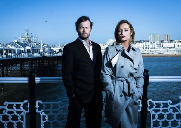 Bill Ward plays Detective Superintendent Roy Grace with Laura Whitmore as pathologist Cleo