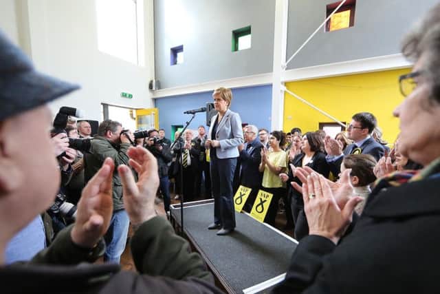 Nicola Sturgeon campaigning in the East End of Glasgow yesterday. Picture:  Allan Milligan