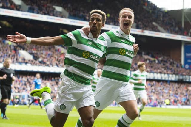 Scott Sinclair celebrates with Leigh Griffiths after he scores a penalty for his side. Pic: SNS/Paul Devlin