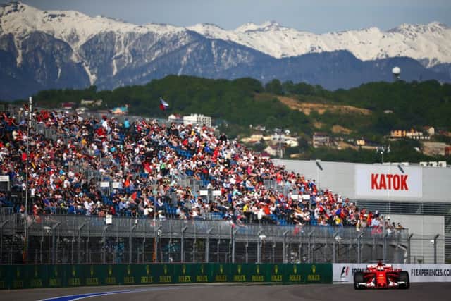 Sebastian Vettel on his way to pole position in a picturesque Sochi.  Photograph: Dan Istitene/Getty Images