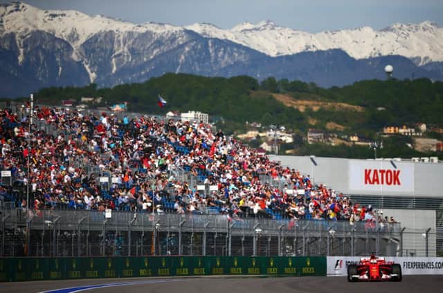 Sebastian Vettel on his way to pole position in a picturesque Sochi.  Photograph: Dan Istitene/Getty Images