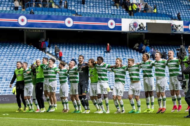 Celtic's players celebrate at full time. Pic: SNS/Craig Williamson