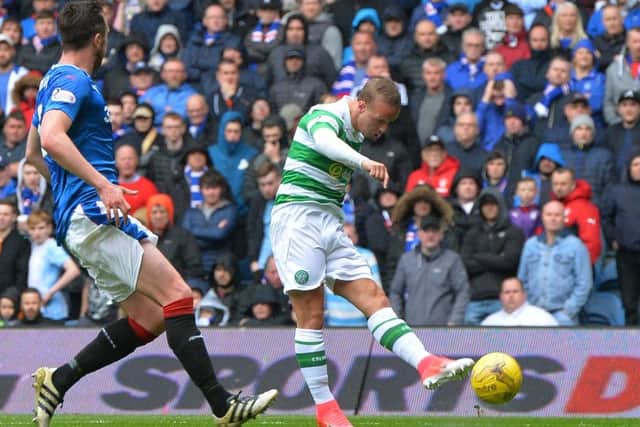 Leigh Griffiths fires a devastating, left-footed shot into the net to make it 2-0. Photograph: Mark Runnacles/Getty