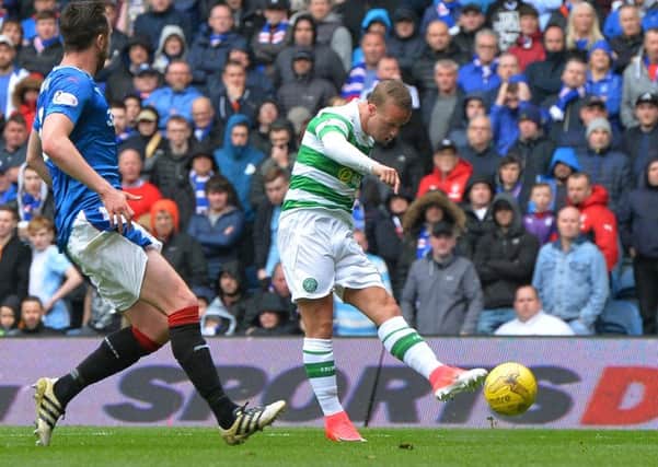 Leigh Griffiths fires a devastating, left-footed shot into the net to make it 2-0. Photograph: Mark Runnacles/Getty