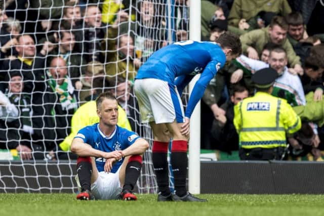 Clint Hill and Andy Halliday (right) after left dejected after fifth goal. Pic: SNS/