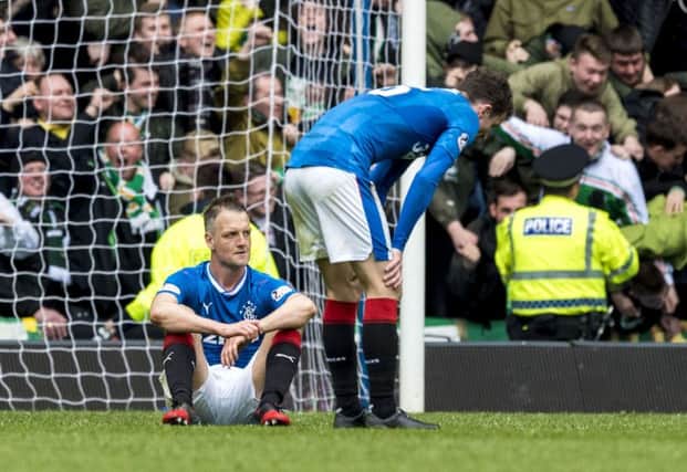 Clint Hill and Andy Halliday (right) after left dejected after fifth goal. Pic: SNS/