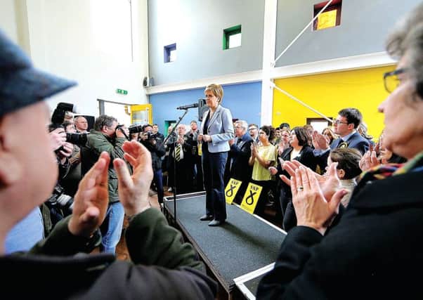 Nicola Sturgeon campaigning in the East End of Glasgow yesterday. Picture: Allan Milligan