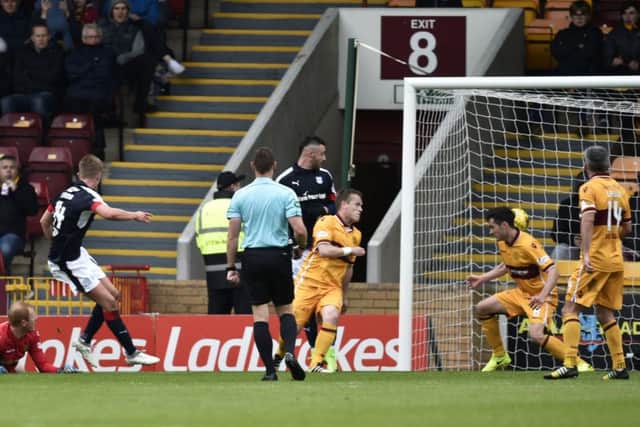 Dundee's Mark O'Hara scores the opening goal. Pic: SNS/Rob Casey
