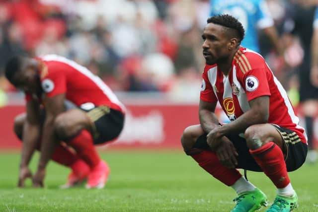 Jermain Defoe left dejected after Sunderland's relegation. Pic: Ian MacNicol/Getty Images
