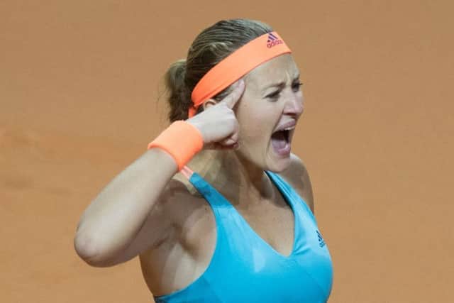 France's Kristina Mladenovic reacts afterdefeating Maria Sharapova. Picture: Getty Images