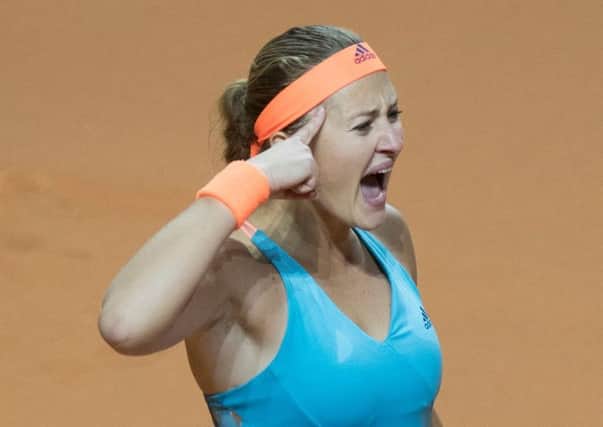 France's Kristina Mladenovic reacts afterdefeating Maria Sharapova. Picture: Getty Images