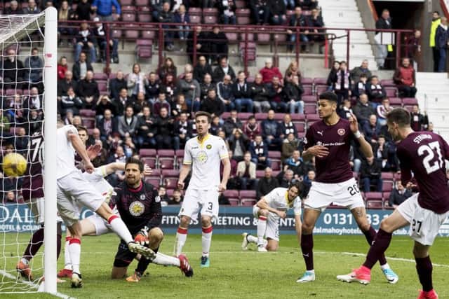 Andraz Struna, right, scores Hearts second equaliser during their 2-2 draw with Partick Thistle. Picture: SNS.