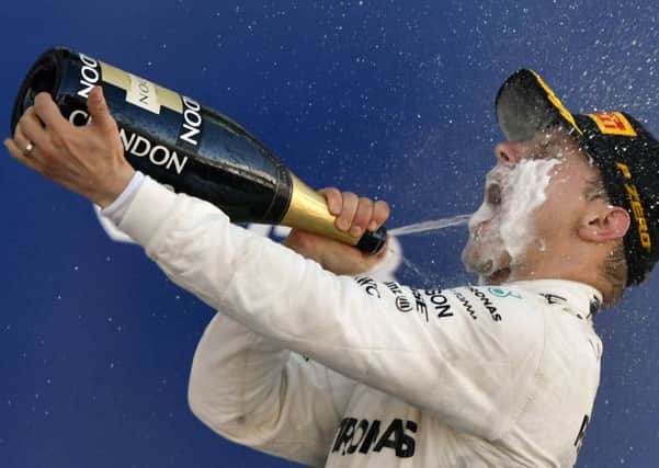 Valtteri Bottas celebrates after leading almost every lap at the Sochi Autodrom on his way to becoming the fifth Finn to win a Grand Prix. Photograph: Getty Images