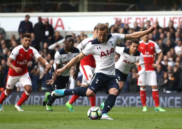 Harry Kane seals Tottenham Hotspurs 2-0 victory over north London rivals Arsenal from the penalty spot. Picture: Getty.