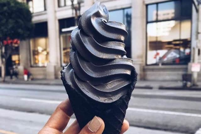 Apparently the black ice cream tastes a bit like chocolate, but with charcoal undertones. Yum? Picture: Hemedia