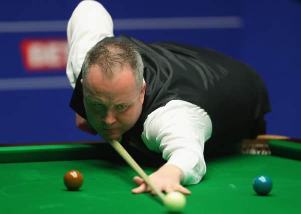 John Higgins has a three-frame lead over Mark Selby. Picture: Getty