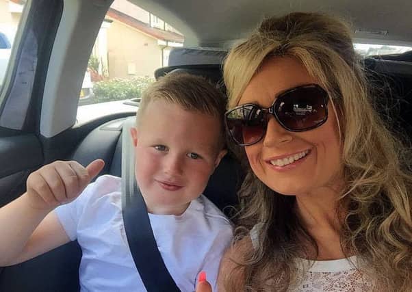 Jennifer Ure Stewart with Luke who is suffering from an aggressive brain tumour