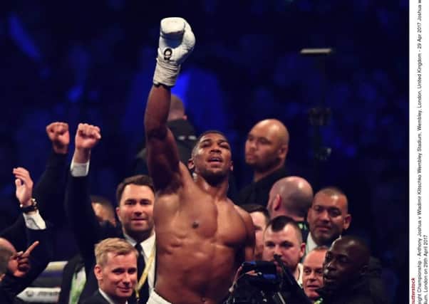 Anthony Joshua celebrates after his 11th-round victory over Wladimir Klitschko on Saturday. Picture: Rex/Shutterstock.