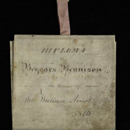 Diploma of the Beggars Benison, which was given to members, folded with attached seal. PIC St Andrews University Library/Special Collections.