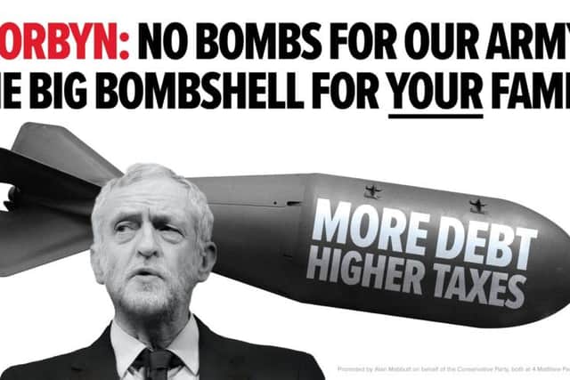 A new Tory poster warning that families face a tax and debt bombshell under Jeremy Corbyn's leadership. Picture: PA
