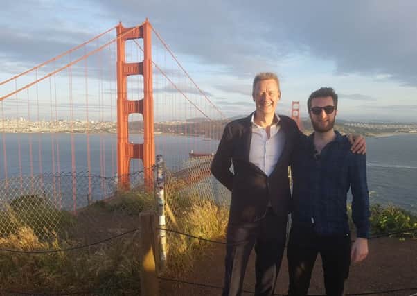 Russell Dalgleish, left, and Bruce Walker of FutureX take time to enjoy the view of the Golden Gate Bridge. Picture: Contributed