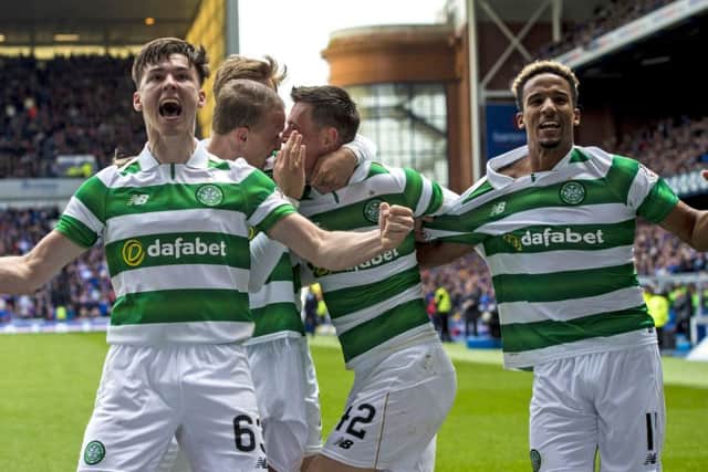 Celtic's Kieran Tierney and Scott Sinclair celebrate Callum McGregor's goal in the recent 5-1 win. Picture: SNS