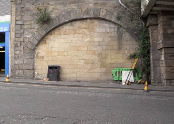 One of the former entrance arches to the vaults from New Street.