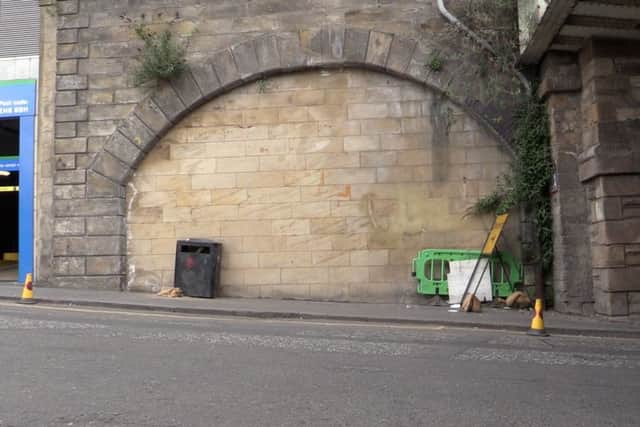 One of the former entrance arches to the vaults from New Street.