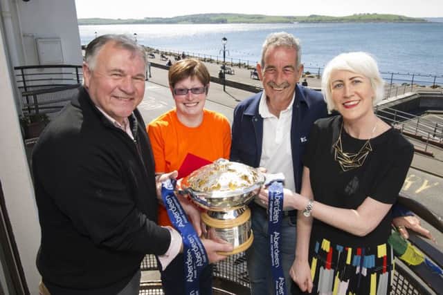Left to right: Les Ward of the Gillians Saltire Appeal; Pauline Thomson, a Gillians Saltire Appeal flat user; Sam Torrance and Valerie Ross, Maggies head of fundraising (Scotland). Picture: Bill Fleming
