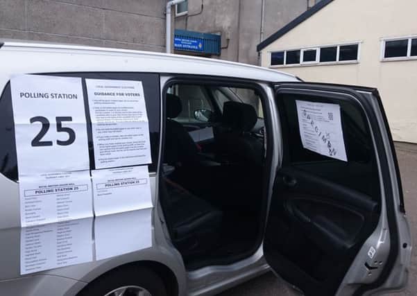 Simone Evans converted her Ford Galaxy into a polling station in Buckie. Picture: SWNS