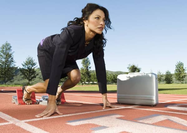 Businesswoman At Starting Blocks