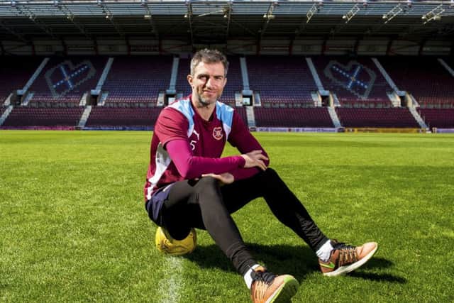 Hearts defender Aaron Hughes has signed a new one-year deal. Picture: SNS