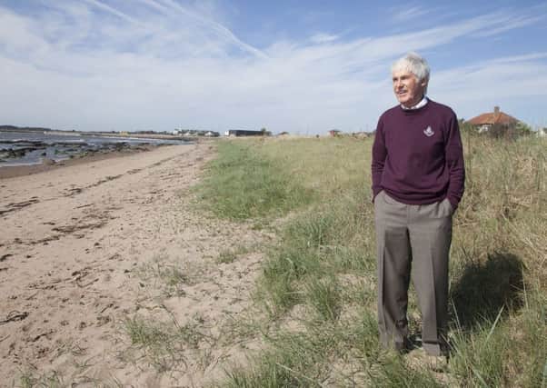 Former Hearts striker Donald Ford on the beach near his Carnoustie home. Picture: Paul Reid