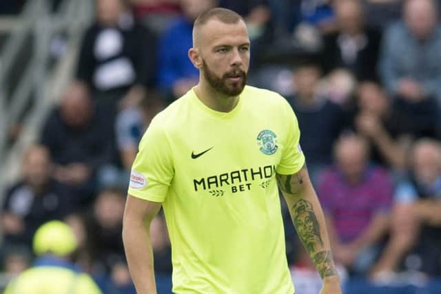 Jordon Forster says Hibs have been 'chilled out' since clinching the Championship title. Picture: SNS.