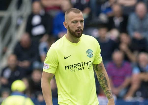 Jordon Forster says Hibs have been 'chilled out' since clinching the Championship title. Picture: SNS.