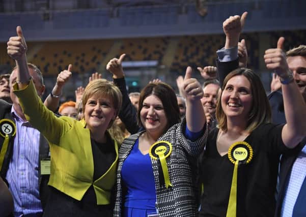 First Minister Nicola Sturgeon and supporters celebrate at 		the Emirates Arena in Glasgow. Picture: SWNS