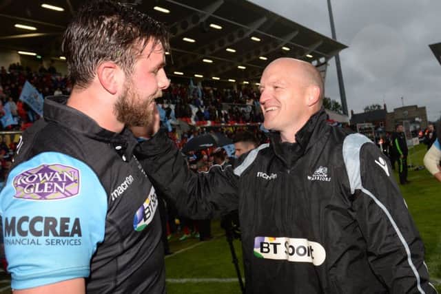 Gregor Townsend, right, who oversees his final game as Glasgow coach in Saturday's 1872 Cup second leg, celebrates after guiding his side to their famous win over Munster in the 2015 Guinness Pro12 final. Picture: SNS/SRU