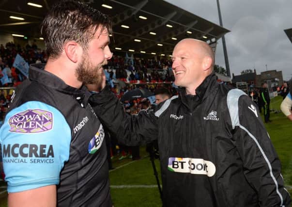 Gregor Townsend, right, who oversees his final game as Glasgow coach in Saturday's 1872 Cup second leg, celebrates after guiding his side to their famous win over Munster in the 2015 Guinness Pro12 final. Picture: SNS/SRU