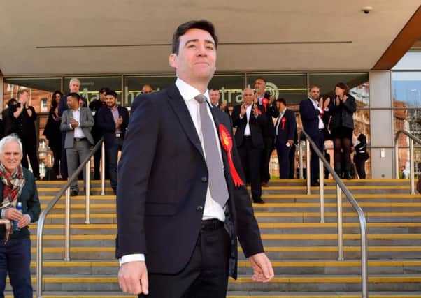 Labour's Andy Burnham celebrates winning the Greater Manchester mayoral election outside Manchester Central. Picture: Getty